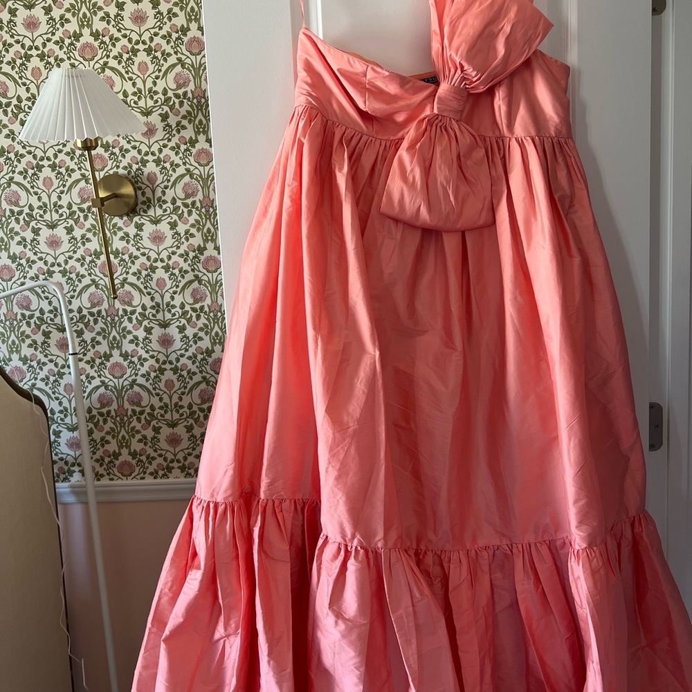 Iconic Anthropology Bow Dress in Peach Perfect for Any Special Occasion